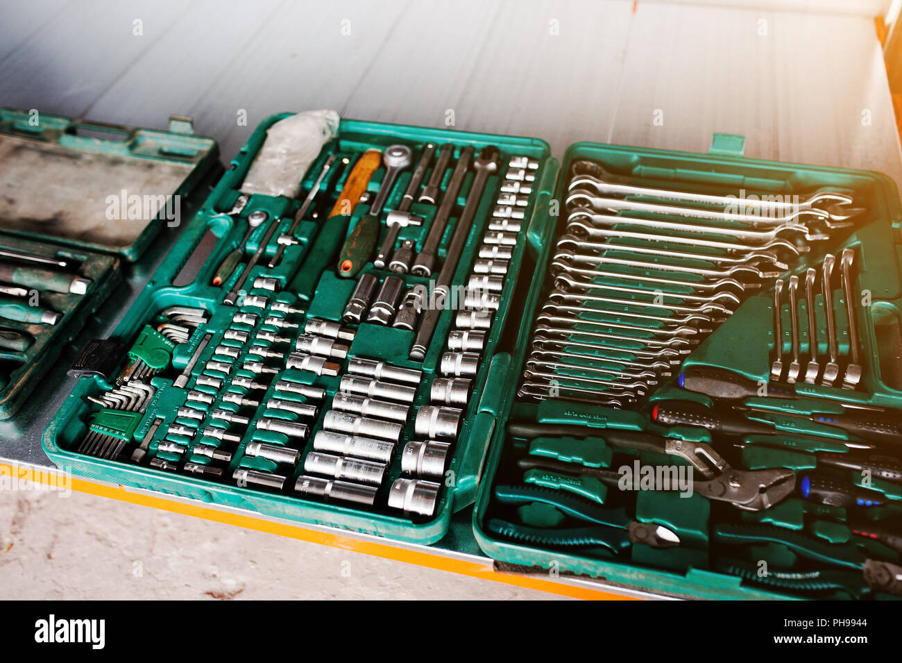 Metal rack with set of wrench spanners tools Stock Photo - Alamy
