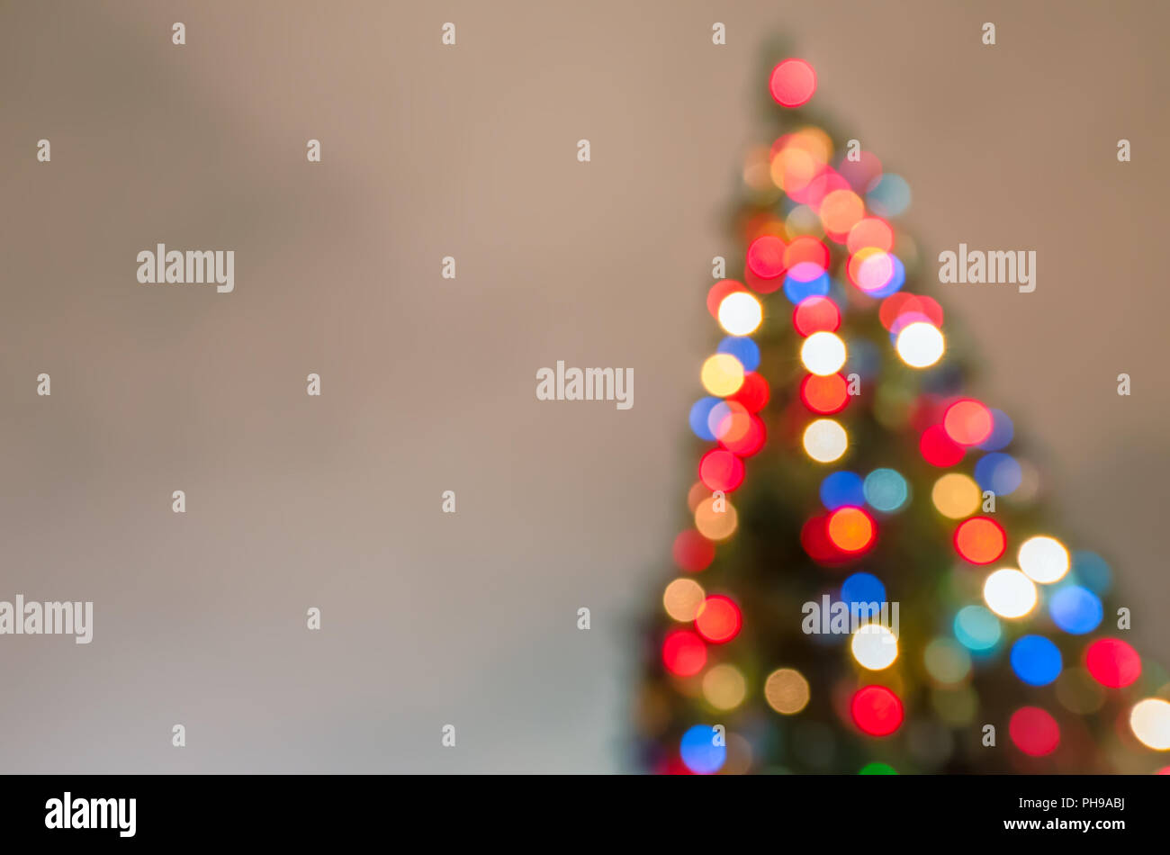 Defocused christmas tree with blurred lights Stock Photo