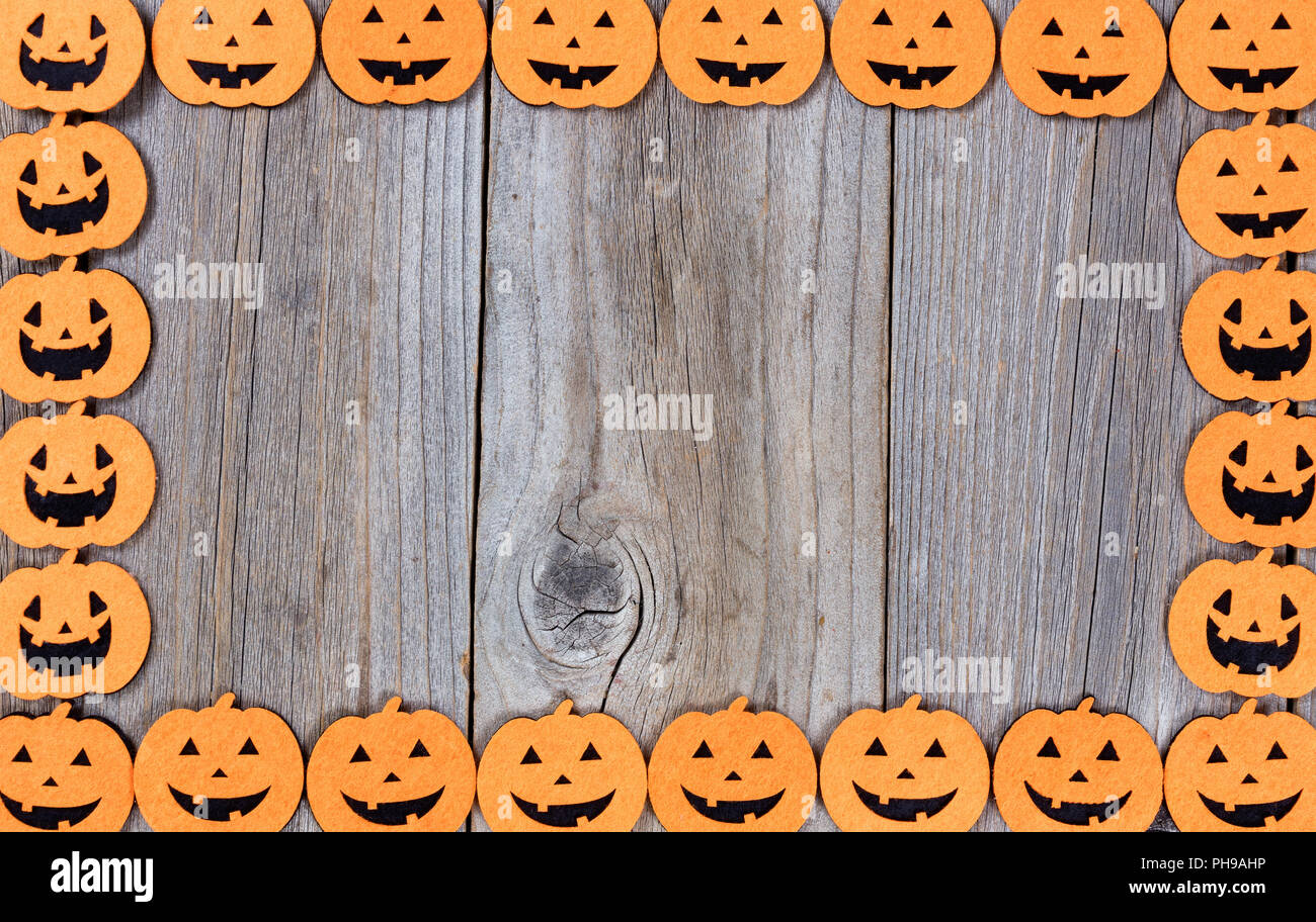 Complete pumpkin border on rustic wooden boards Stock Photo