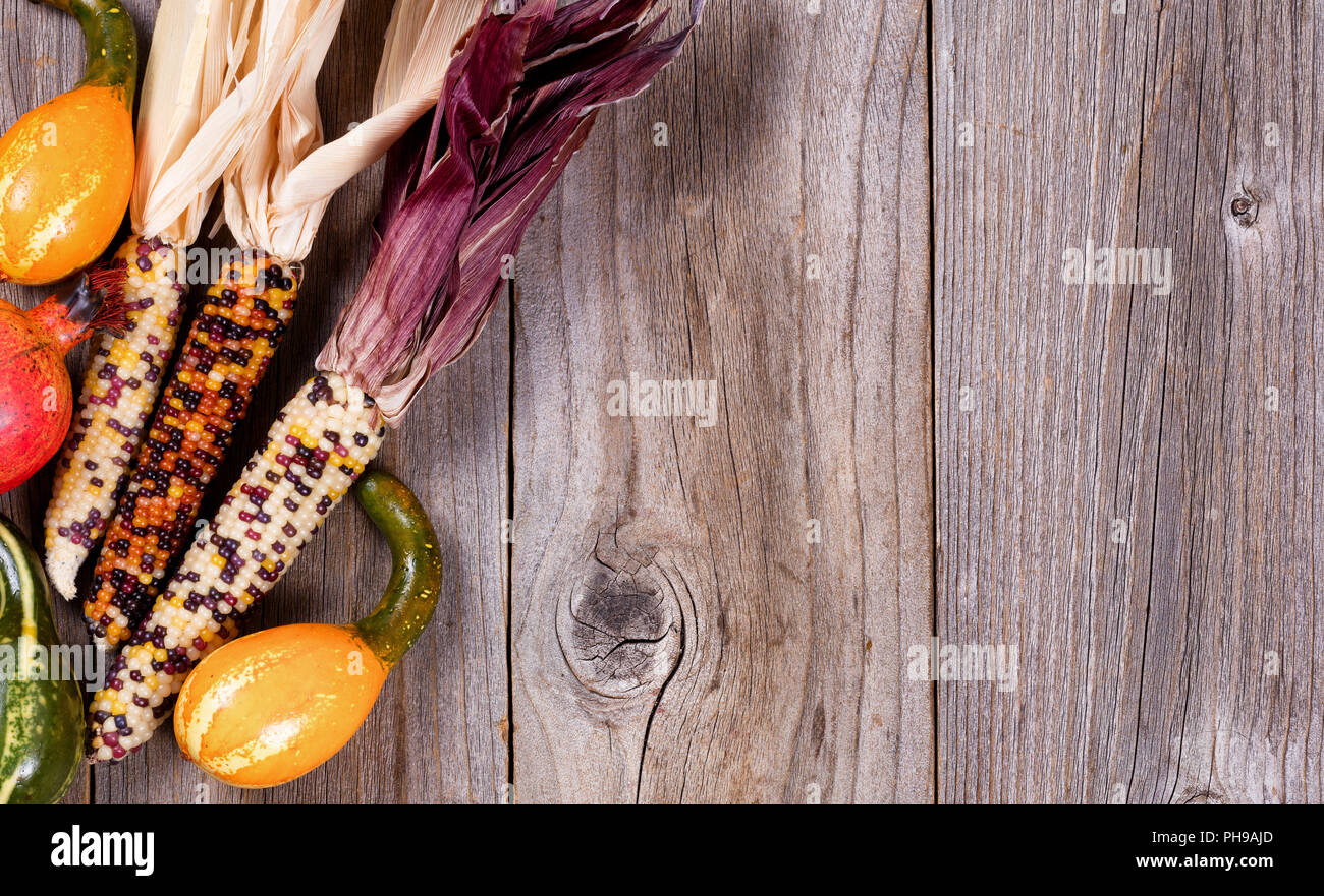 Seasonal mixed fall vegetables on rustic wooden boards Stock Photo