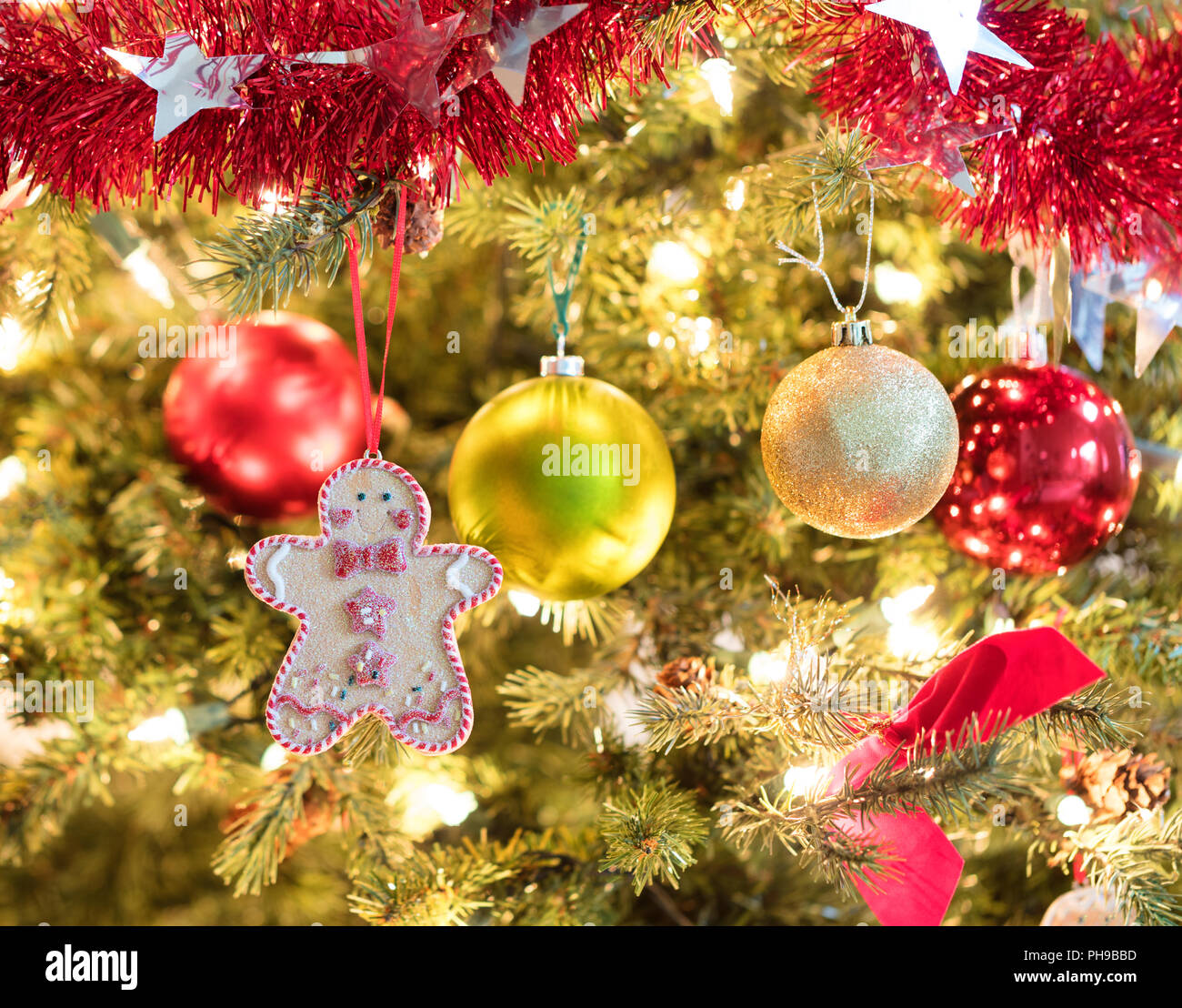 holiday cookie hanging from fully decorated christmas tree stock image - Fully Decorated Christmas Tree holiday cookie hanging from fully decorated christmas tree stock image - Fully Decorated Christmas Tree