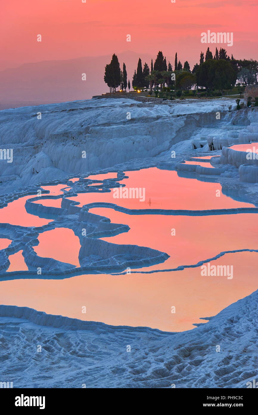 Pamukkale Limestone Terraces At Sunset Pamukkale Turkey Stock Photo pamukkale-limestone-terraces-at-sunset-pamukkale-turkey-stock-photo