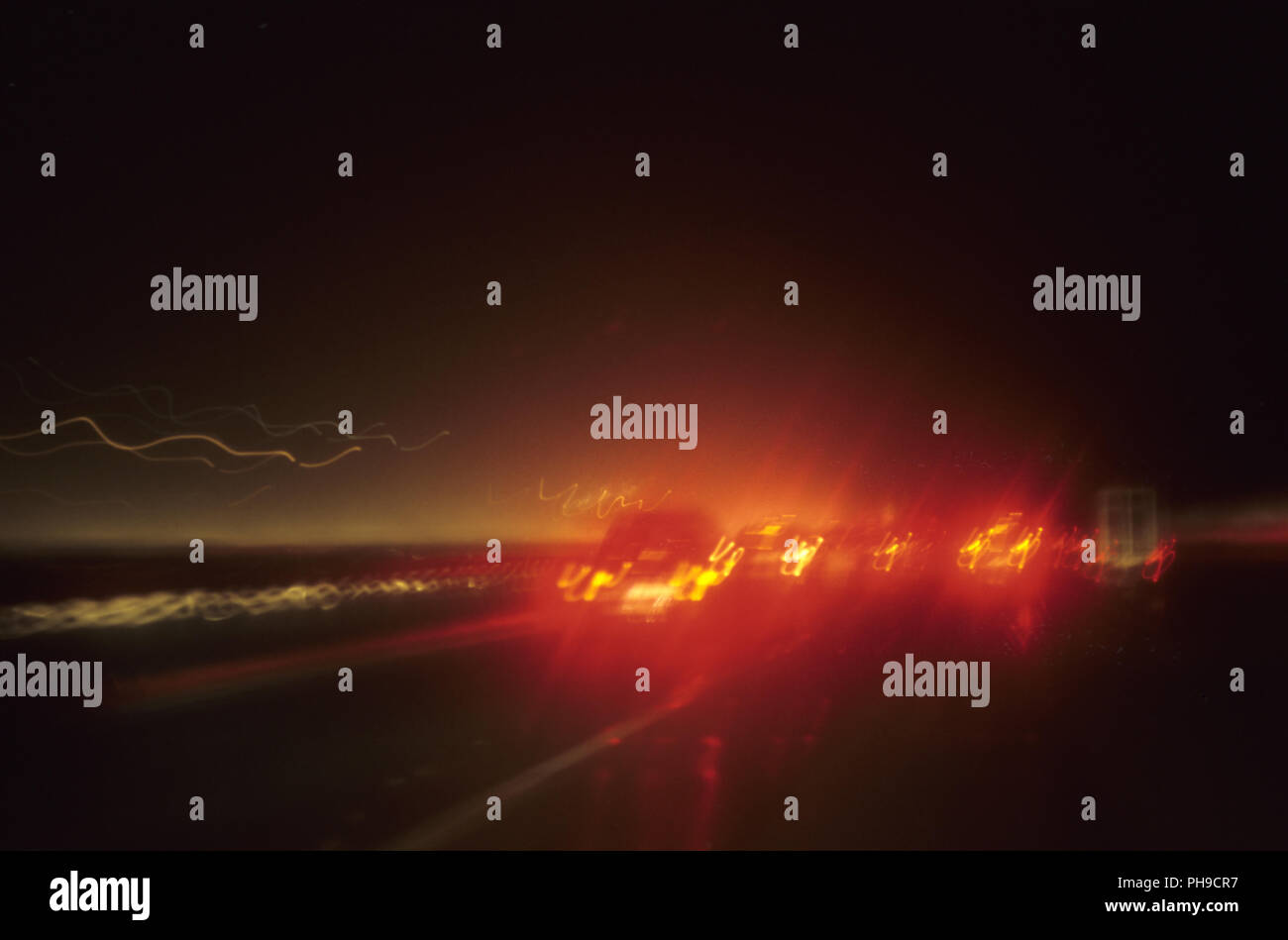 Brake lights in darkness Stock Photo