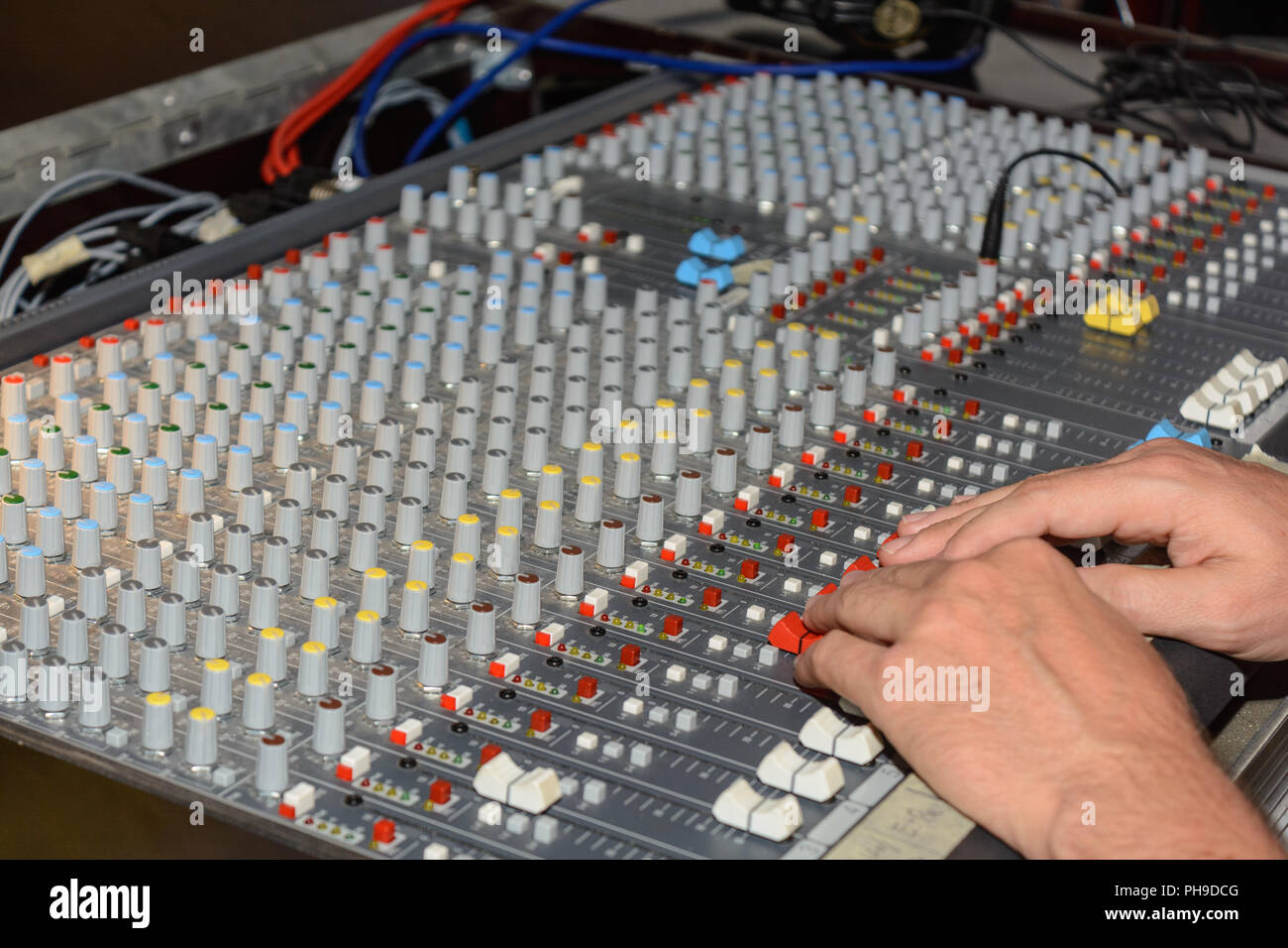 Mixer is controlled and controlled by a producer - close-up Stock Photo