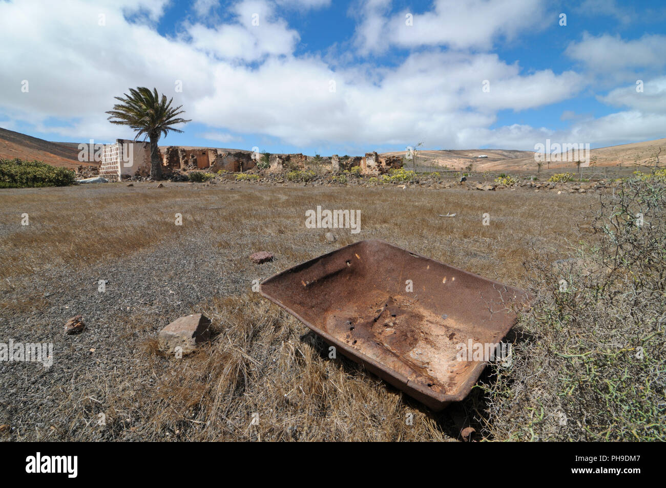 Rusty metal over a desert Stock Photo Alamy