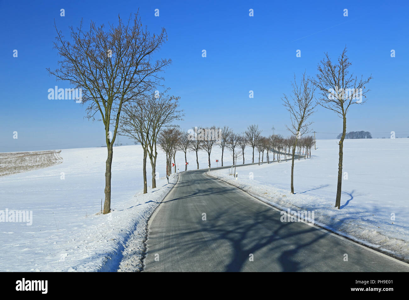 Country road in winter Stock Photo - Alamy