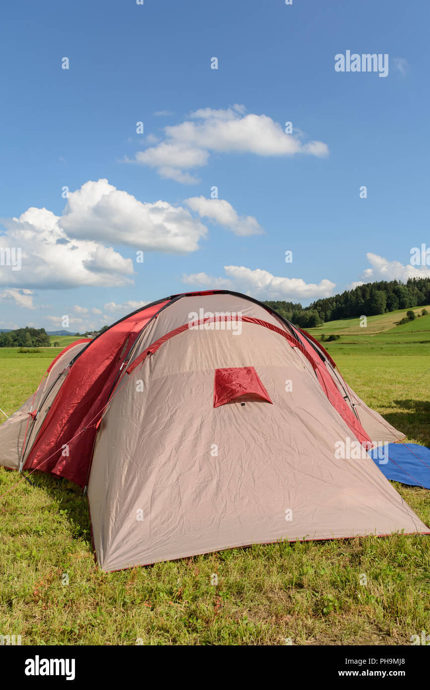 Tense tent in summer in quiet landscape Stock Photo