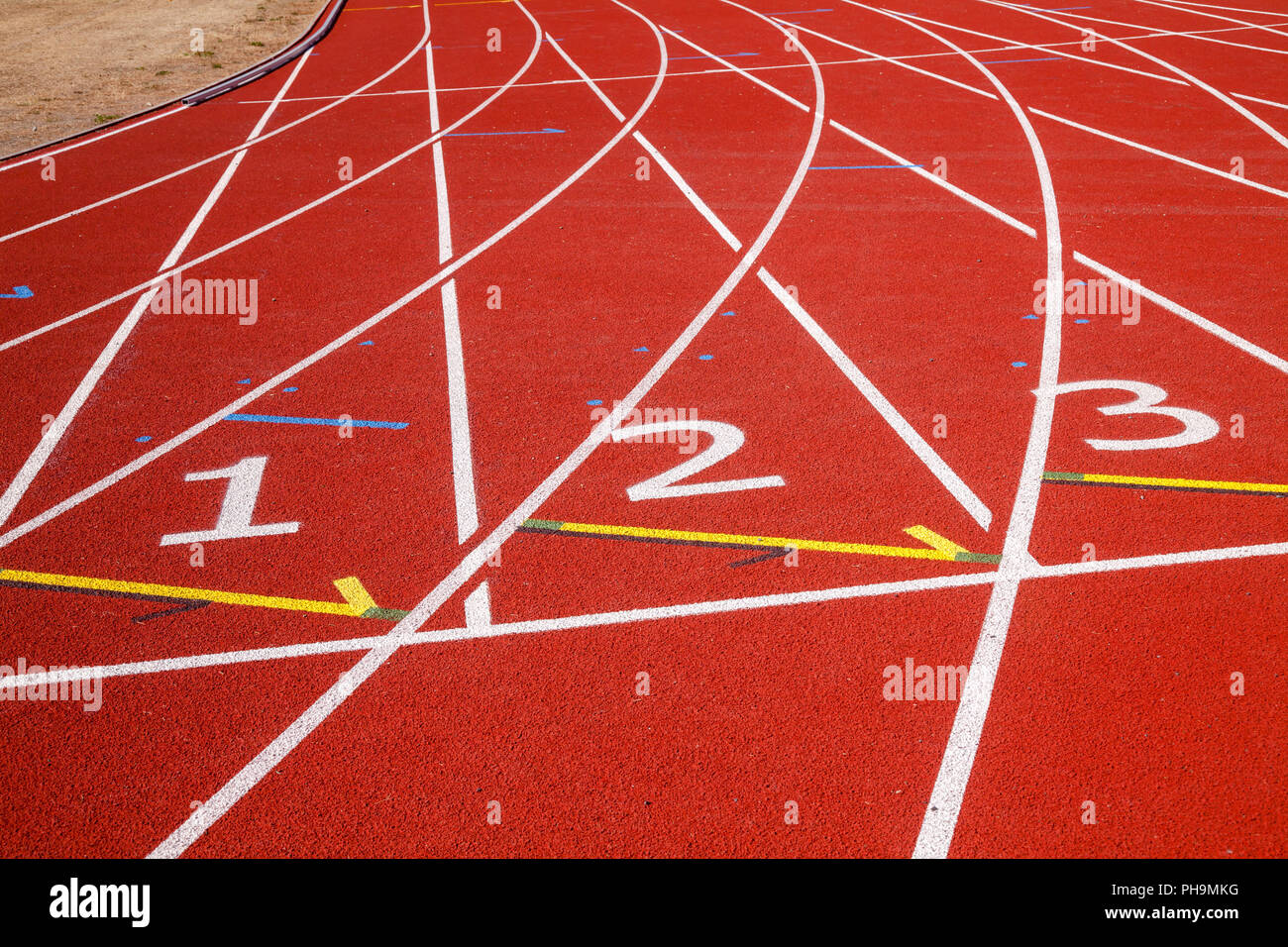Athletic running track with lane numbers at a stadium Stock Photo Alamy