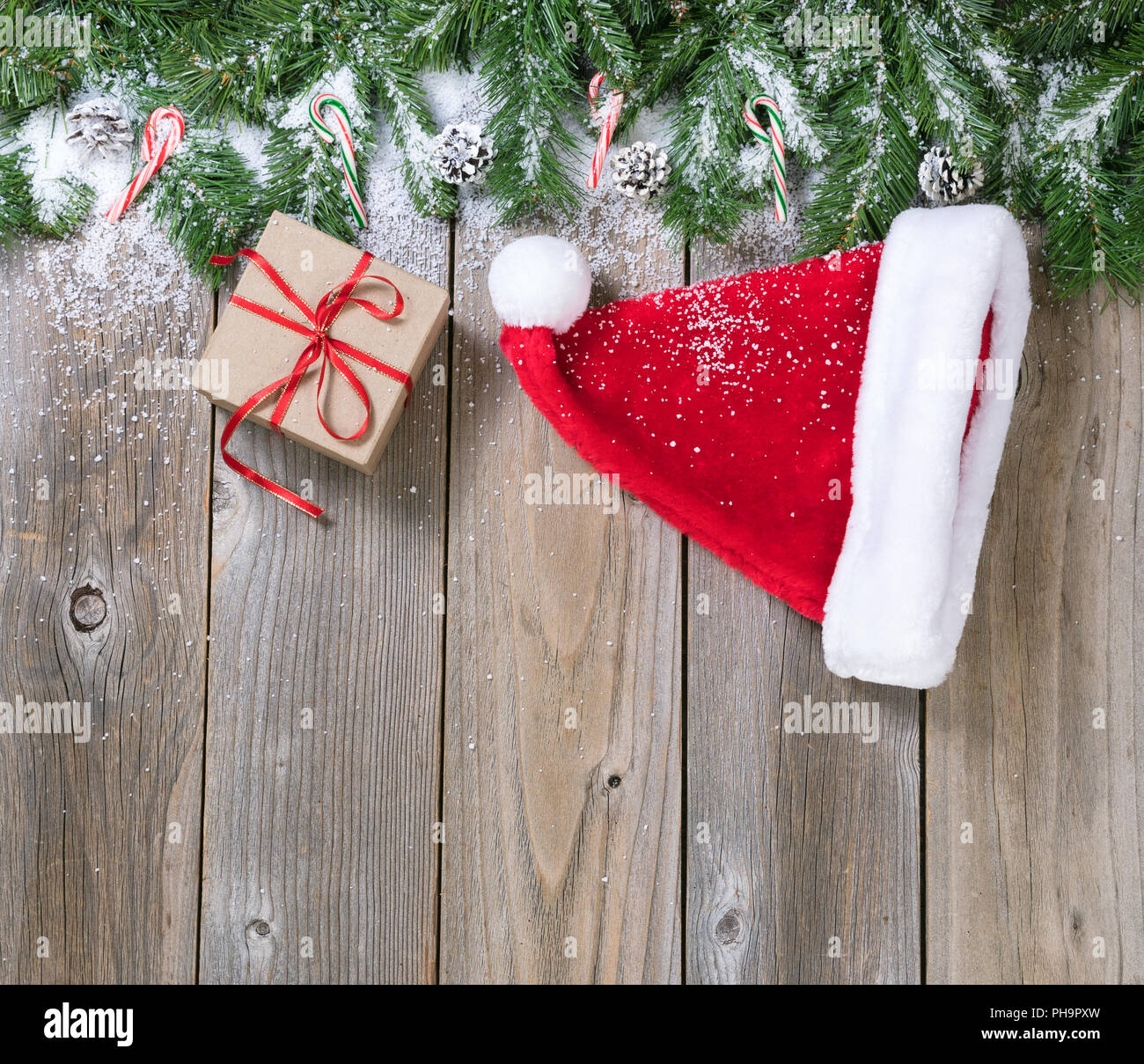 Christmas holiday wooden background with fir branches and snow Stock ...