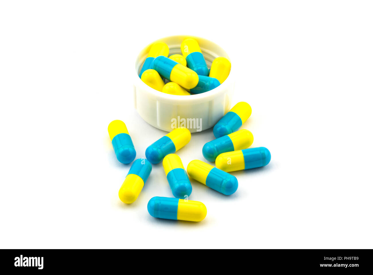 Blue and yellow antibiotic capsule Stock Photo Alamy