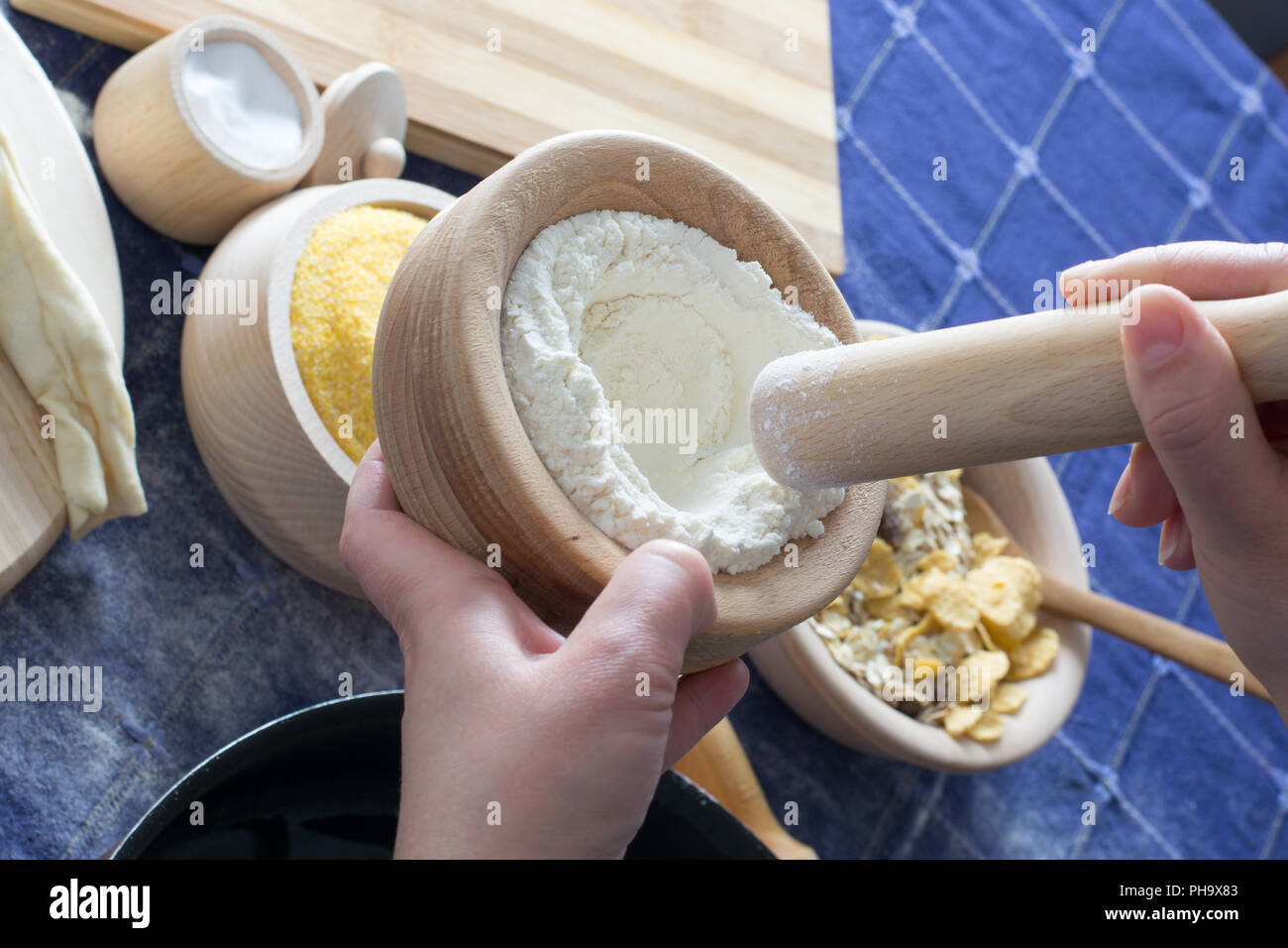 Female hand cutting homemade hi-res stock photography and images - Alamy