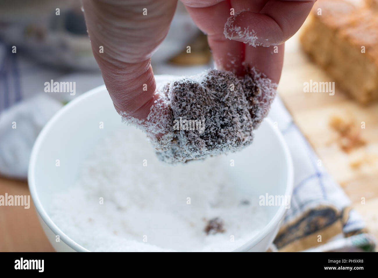 Female hands making brownies with coconut flour Stock Photo
