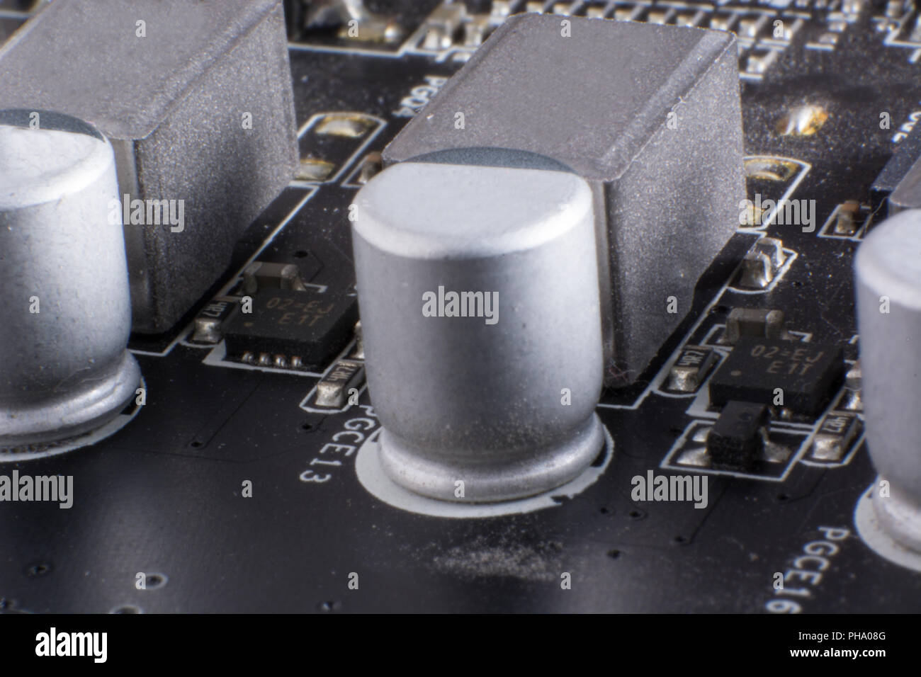 A dusty computer components. Detail of a dusty computer mainboard. Stock Photo