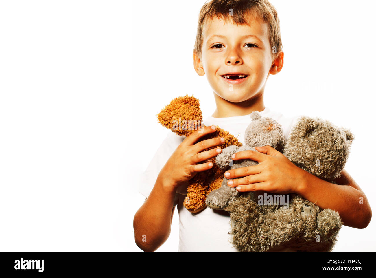 little cute boy with many teddy bears hugging isolated close up Stock ...