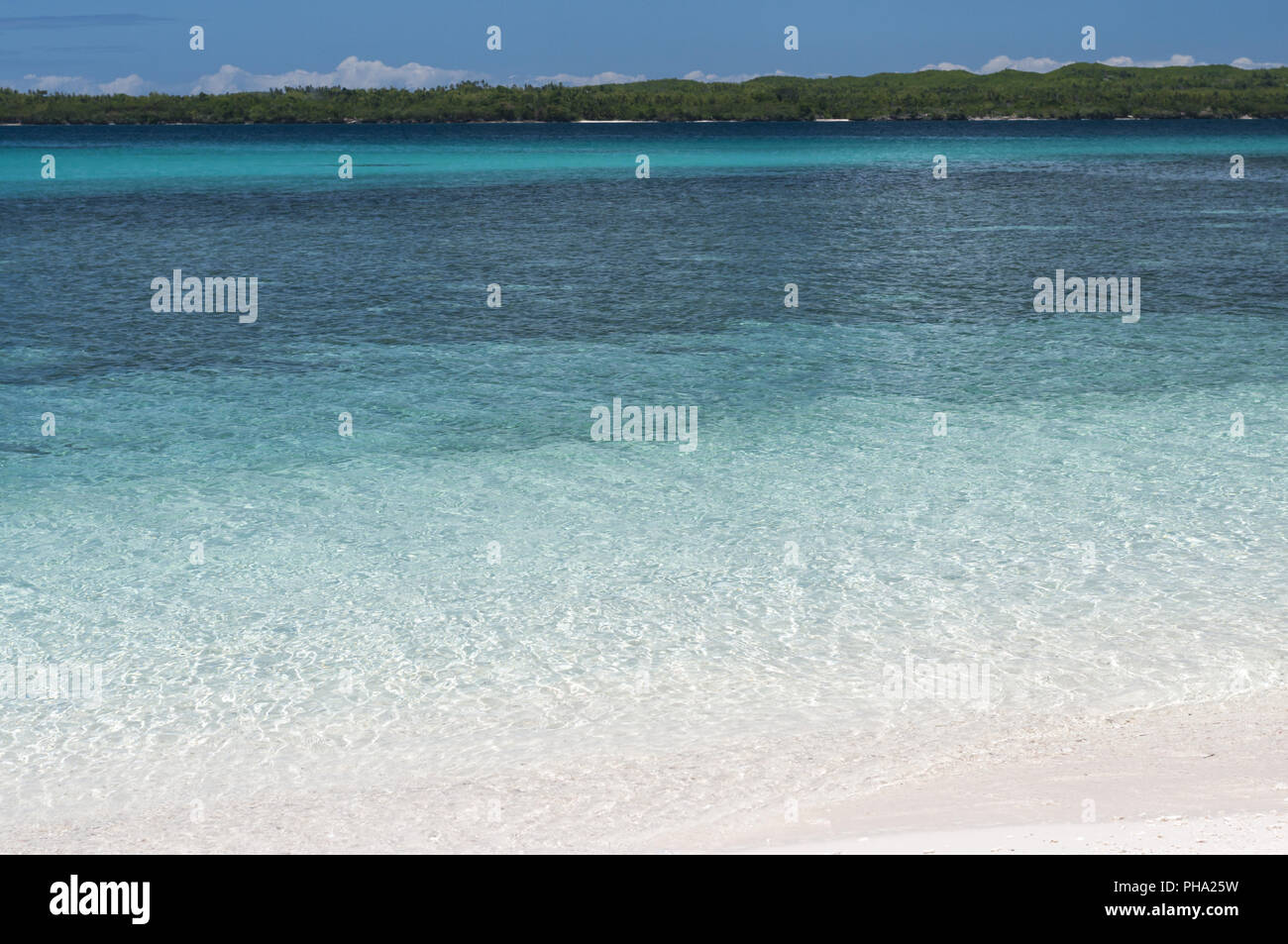 Blue sea with greener tropical island, Philippines Stock Photo - Alamy