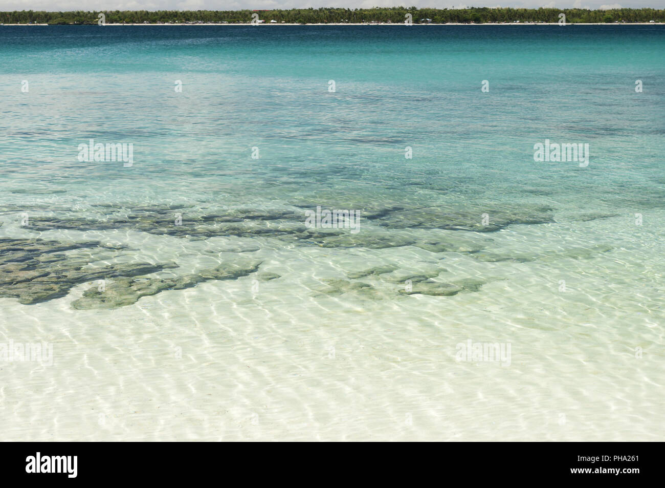 Blue sea with greener tropical island, Philippines Stock Photo - Alamy