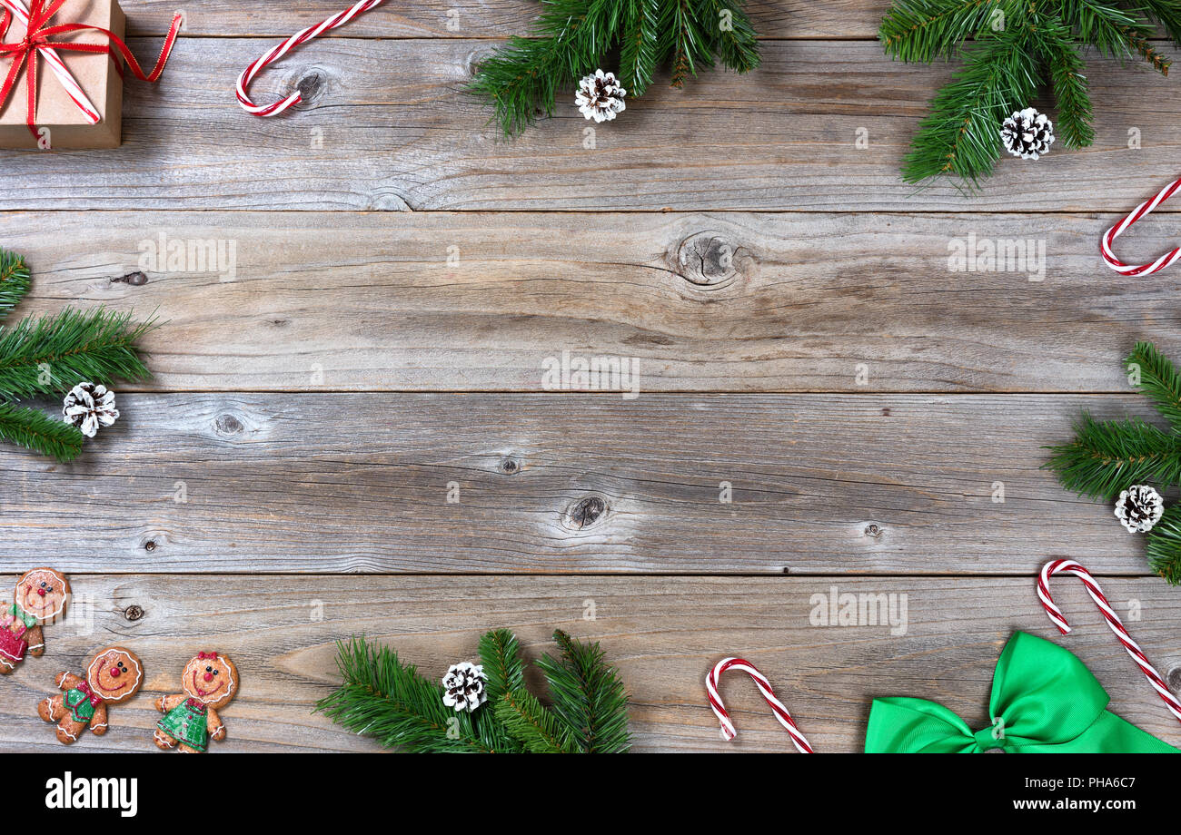 Complete Christmas border on rustic wooden boards Stock Photo