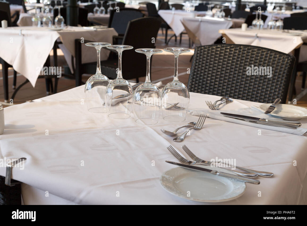 Empty glasses on a dining table hi-res stock photography and images - Alamy