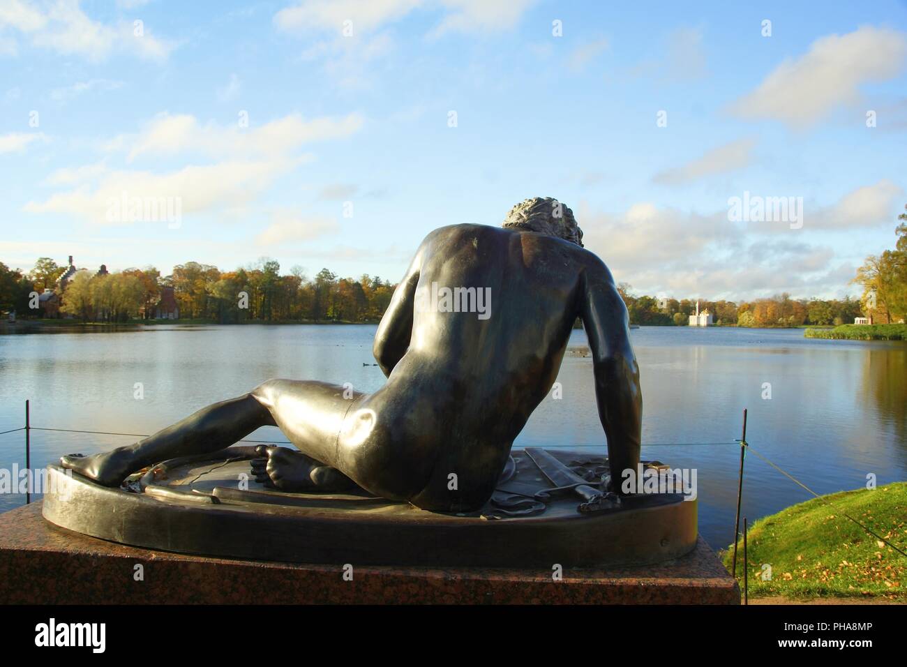 Statue and a Large pond Stock Photo - Alamy