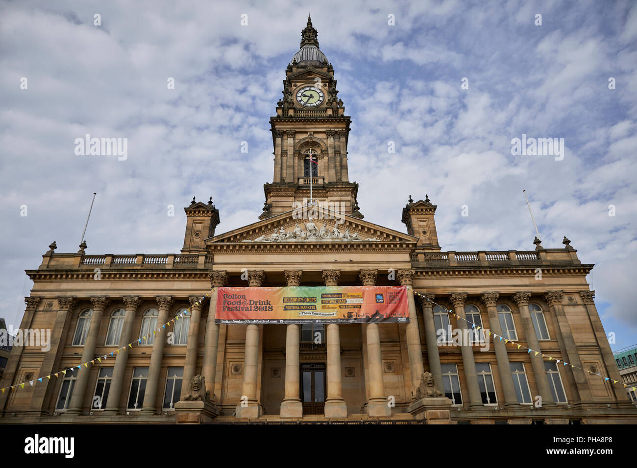 lancashire sandstone  landmark Grade II* listed building Bolton Town Hall facing Victoria Square designs by William Hill with baroque-style clocktower Stock Photo