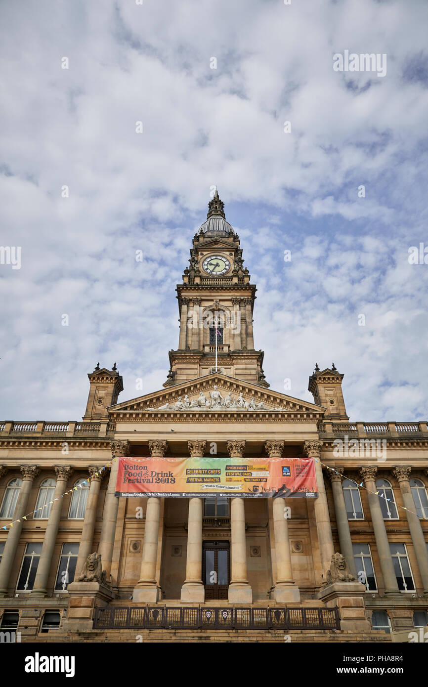 lancashire sandstone  landmark Grade II* listed building Bolton Town Hall facing Victoria Square designs by William Hill with baroque-style clocktower Stock Photo