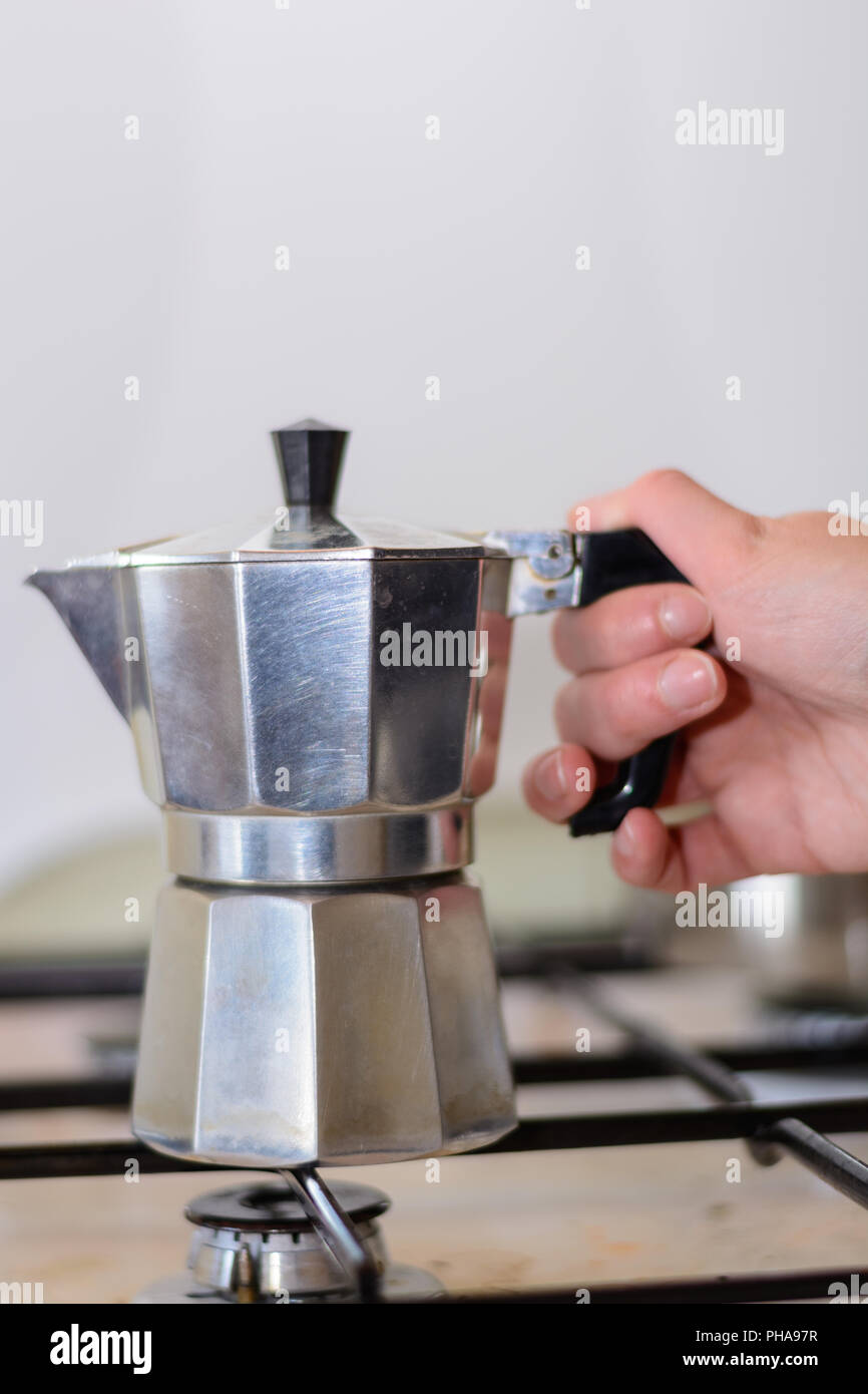 Coffee with classic Italian stainless steel coffee pot - close-up Stock Photo