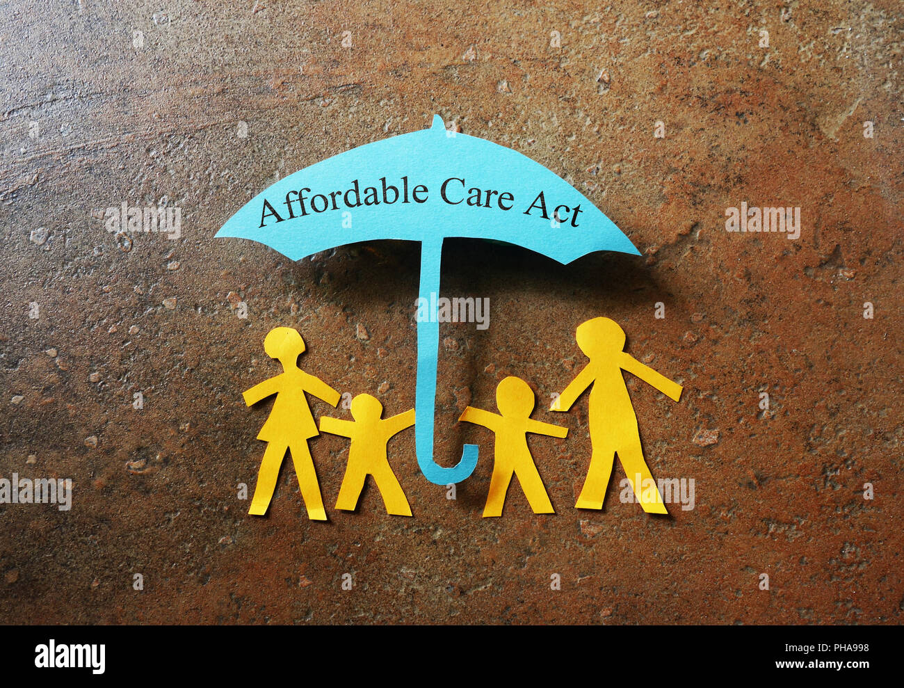 Affordable Care Act paper family Stock Photo
