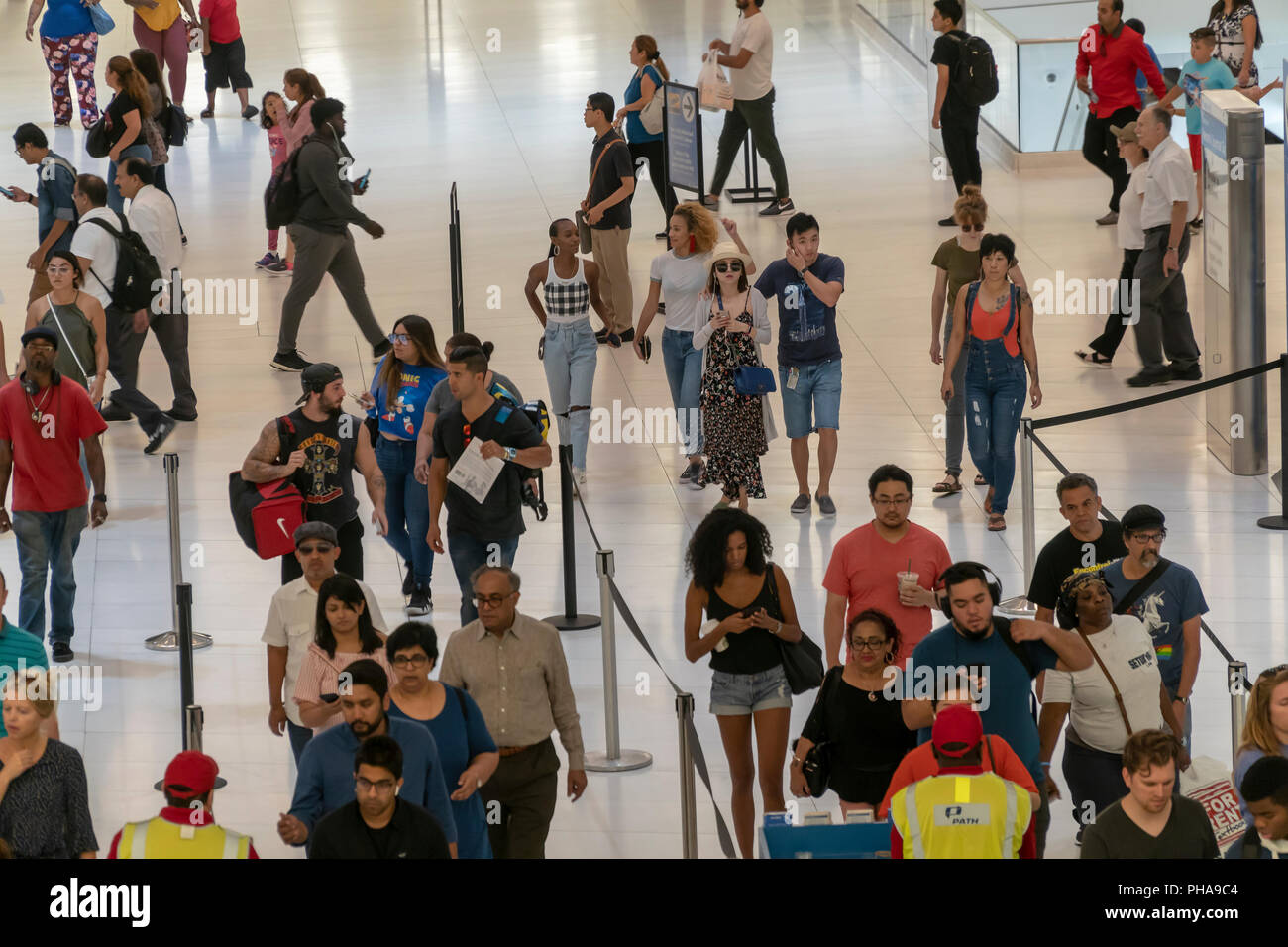 Armies of commuters exit the PATH station and travel through the World Trade Center Transportation Hub on Saturday, August 25, 2018.  (Â© Richard B. Levine) Stock Photo