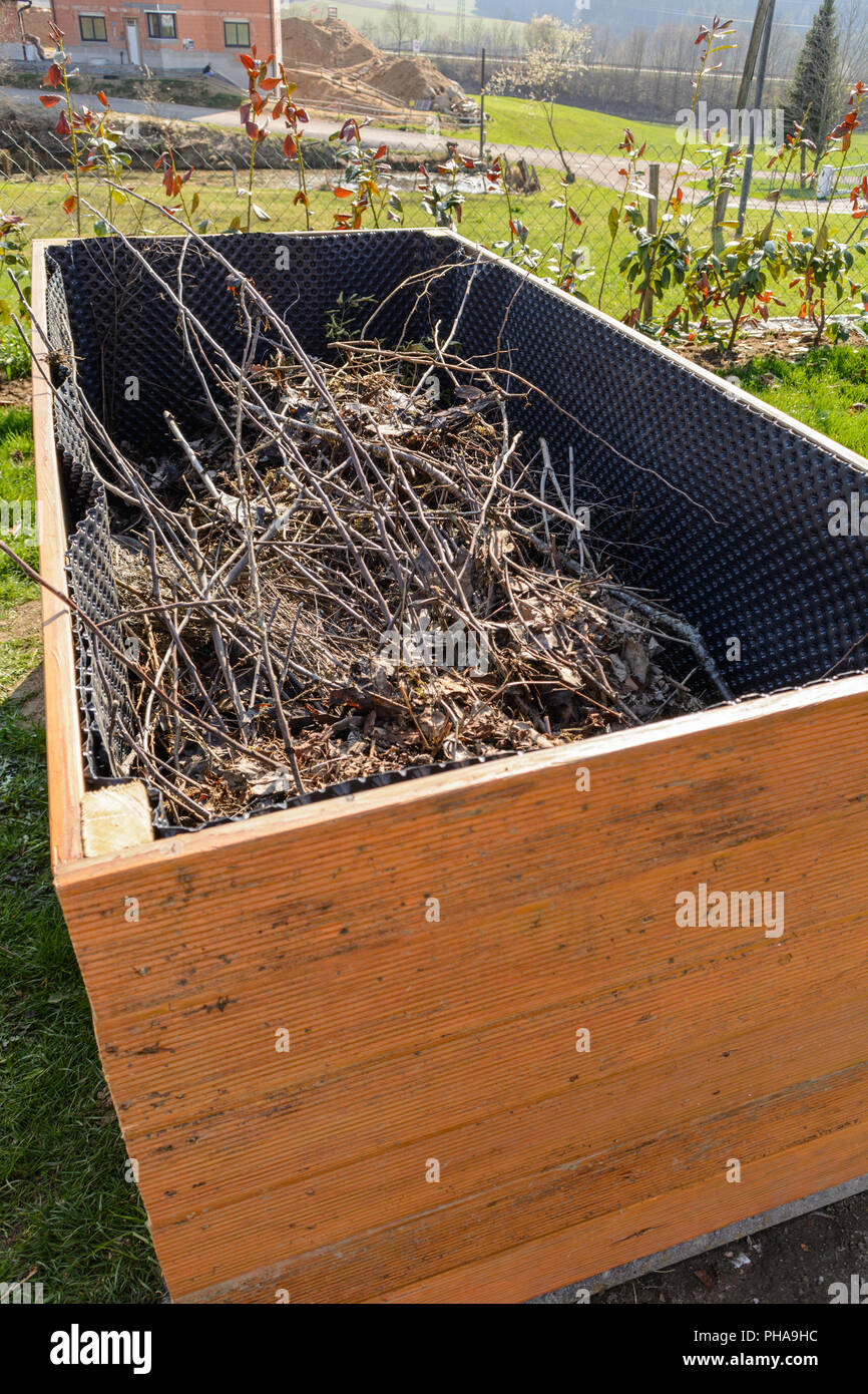 Self-contained raised bed with a shrub cut as a base Stock Photo