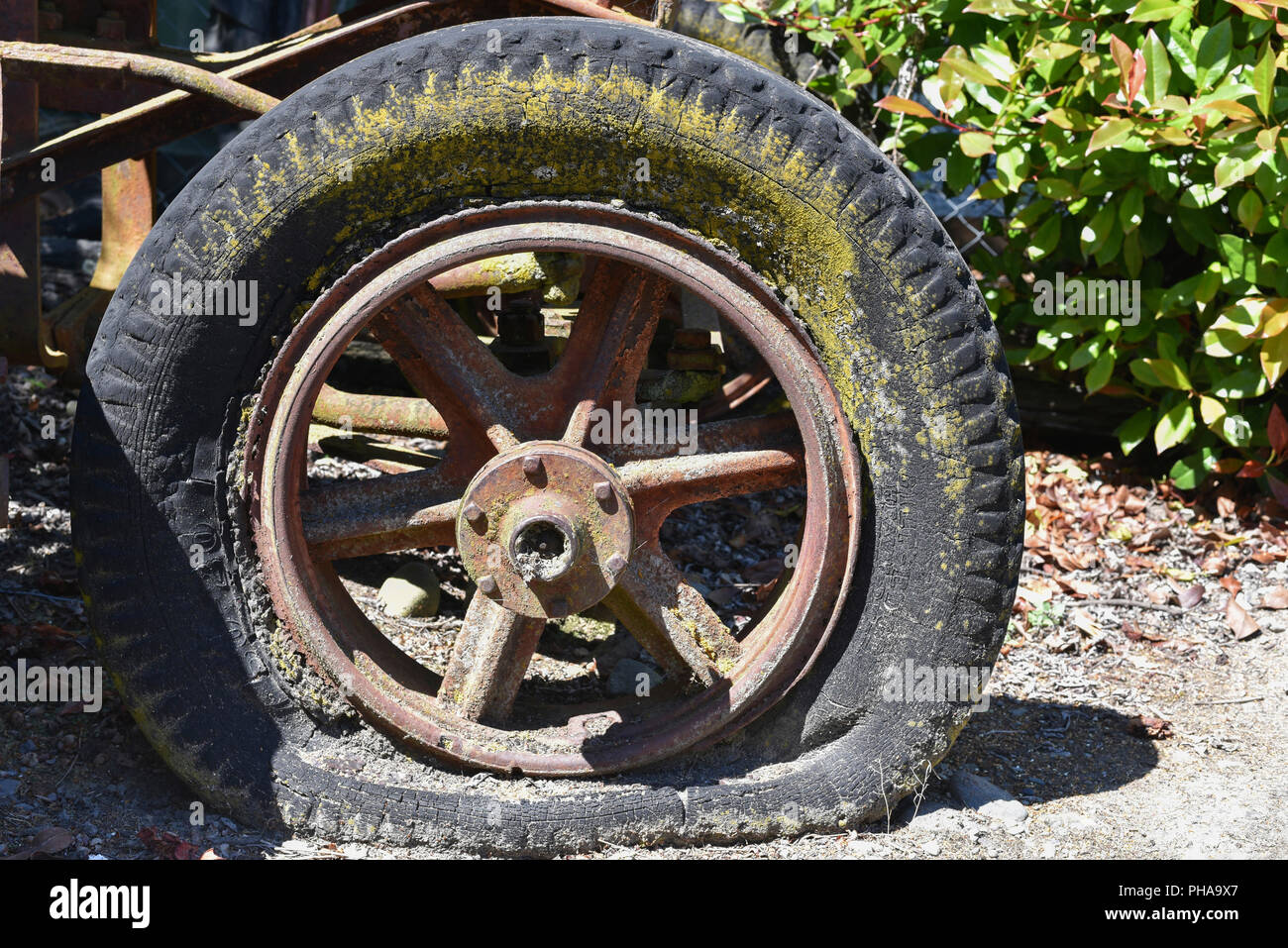 Flat tyre on an old wheel at the Geraldine Transport and Machinery Museum, Canterbury, New Zealand Stock Photo