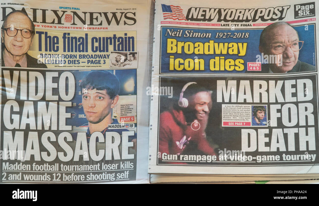 Headlines of the New York tabloid newspapers on Monday, August 27, 2018 feature similar split headlines reporting on the previous days' death of playwright Neil Simon and the mass shooting in Jacksonville, FL at a videogame tournament. (Â© Richard B. Levine) Stock Photo