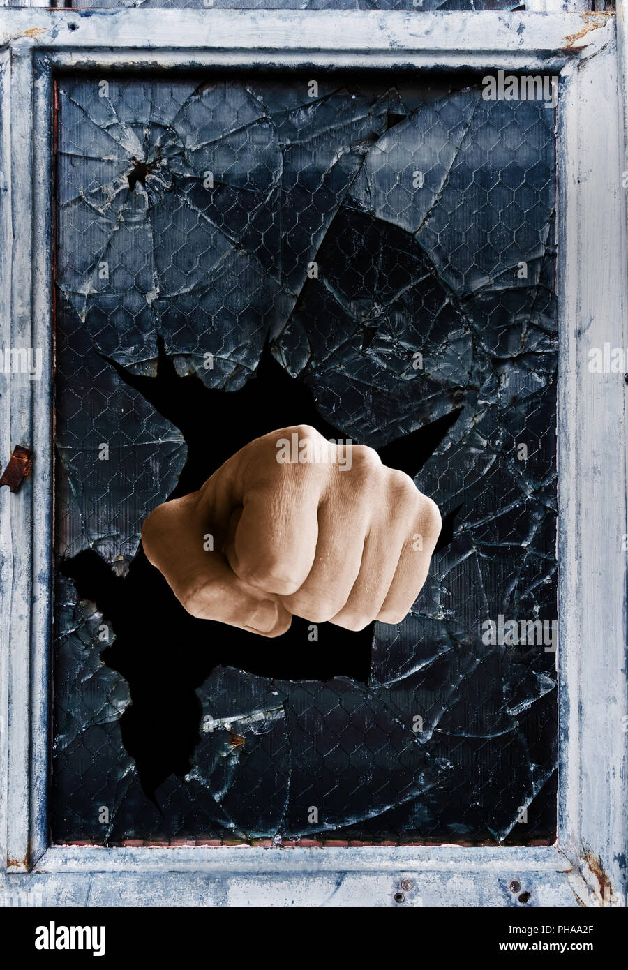 shattered glass fist Stock Photo