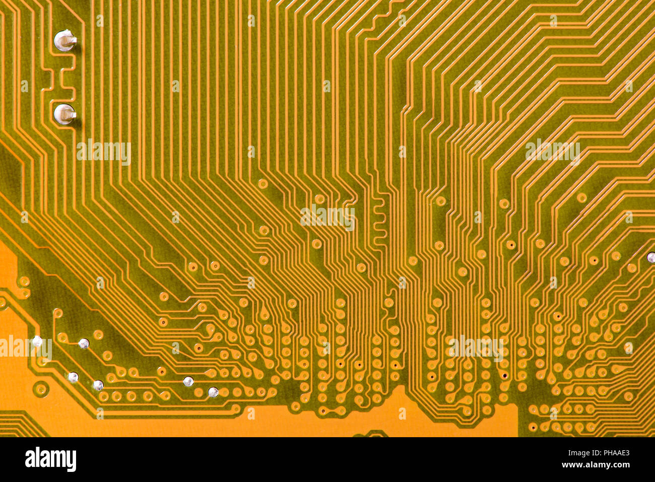 computer motherboard with chips and connecting strips in detail Stock Photo