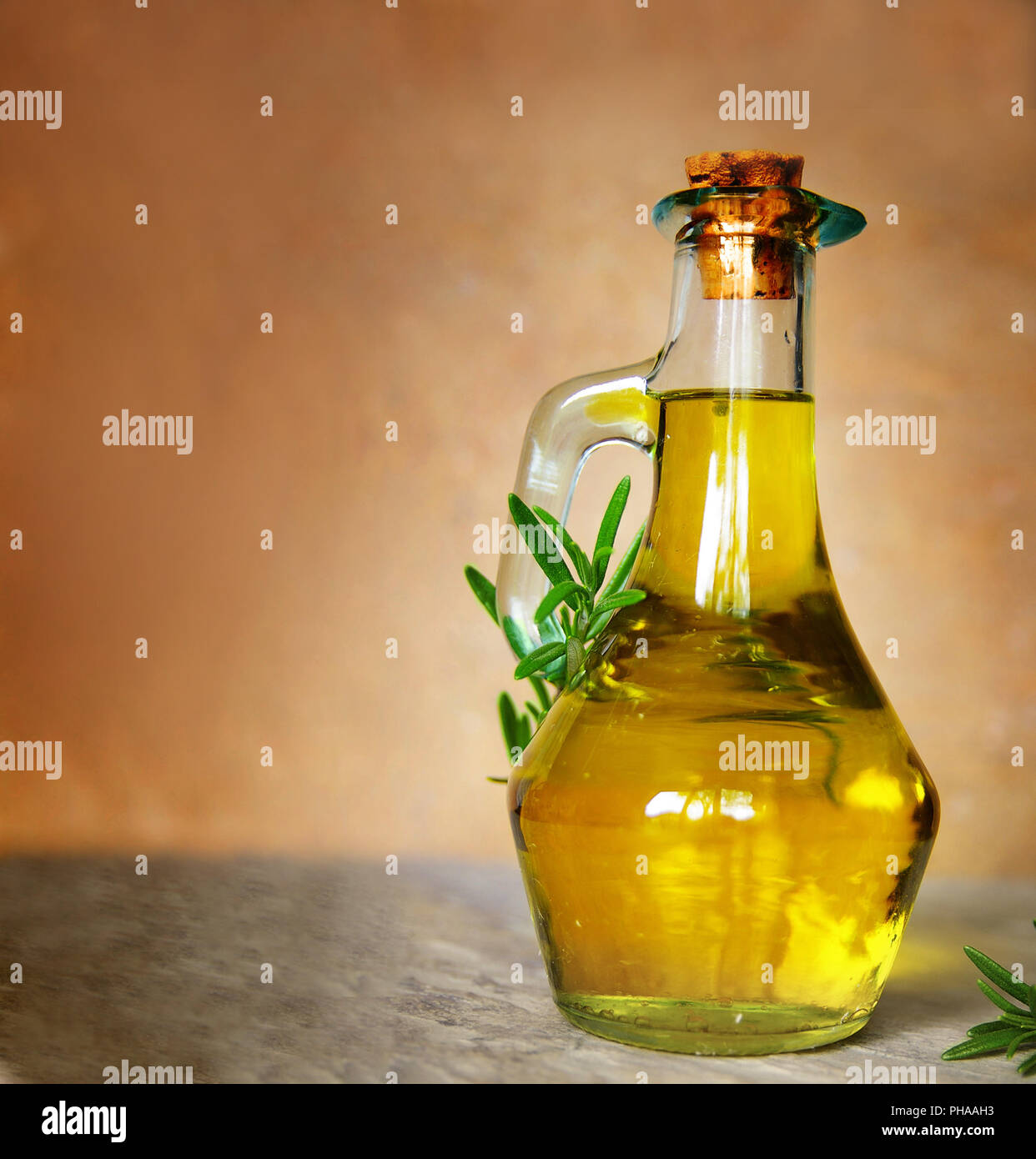 Olive oil in glass container Stock Photo Alamy