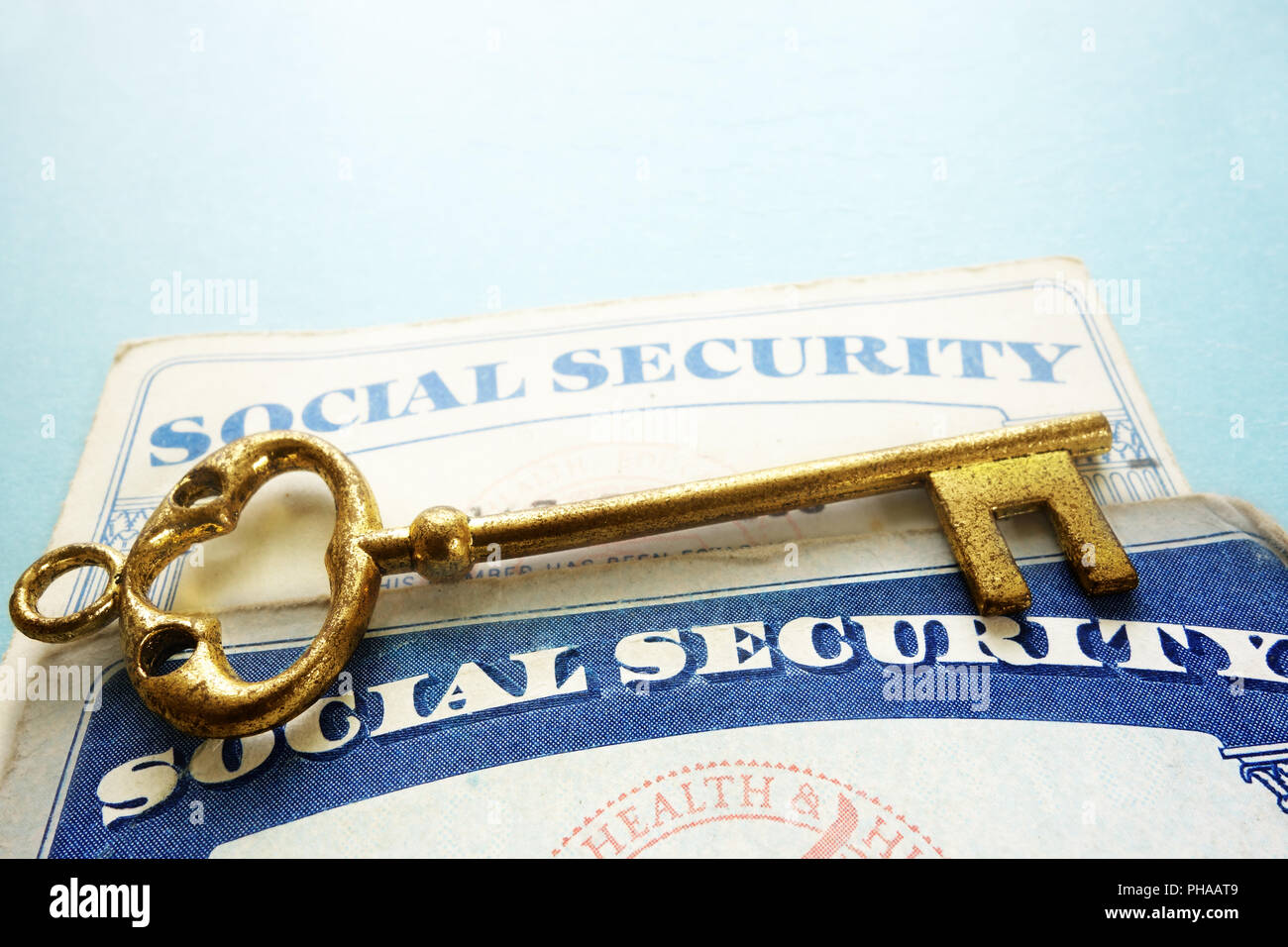 Social Security cards and key Stock Photo