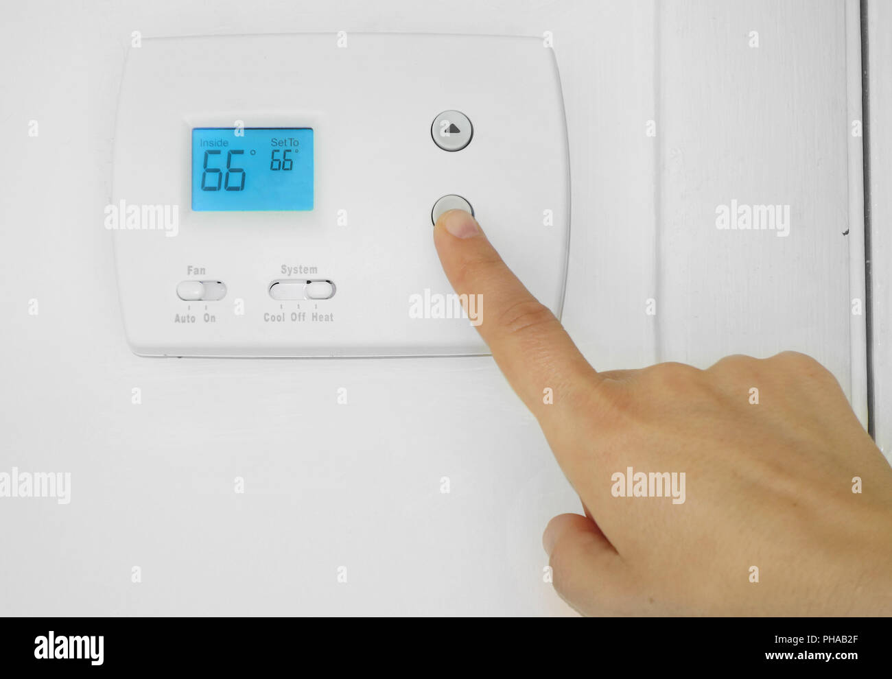thermostat adjustment Stock Photo