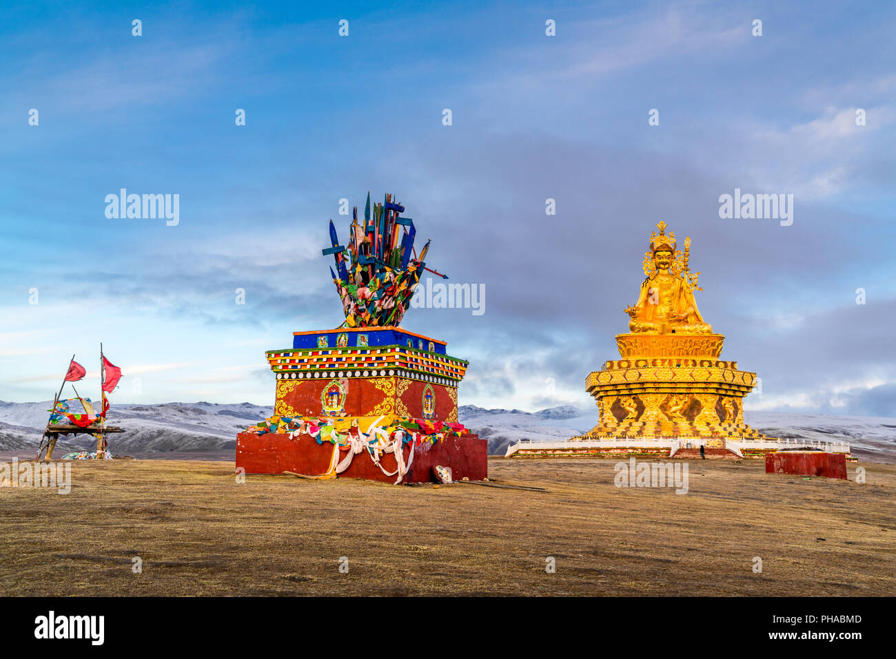 Statue on the hill at Yarchen Gar Monastery in Sichuan Stock Photo