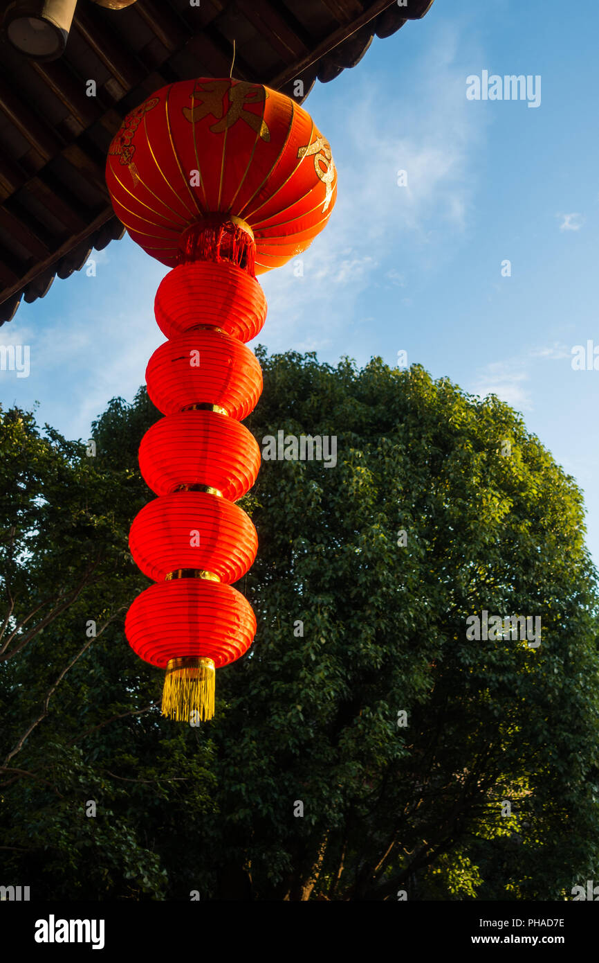 Daytime Chinese Lantern Hanging from Temple Roof Tree Background Stock  Photo - Alamy