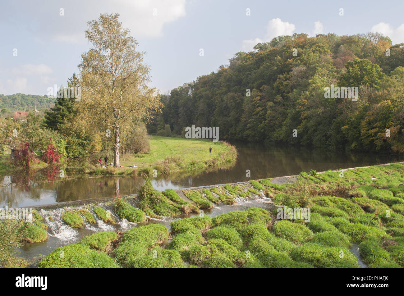 stream weir in the Jagst valley nearby Kirchberg, Germany Stock Photo