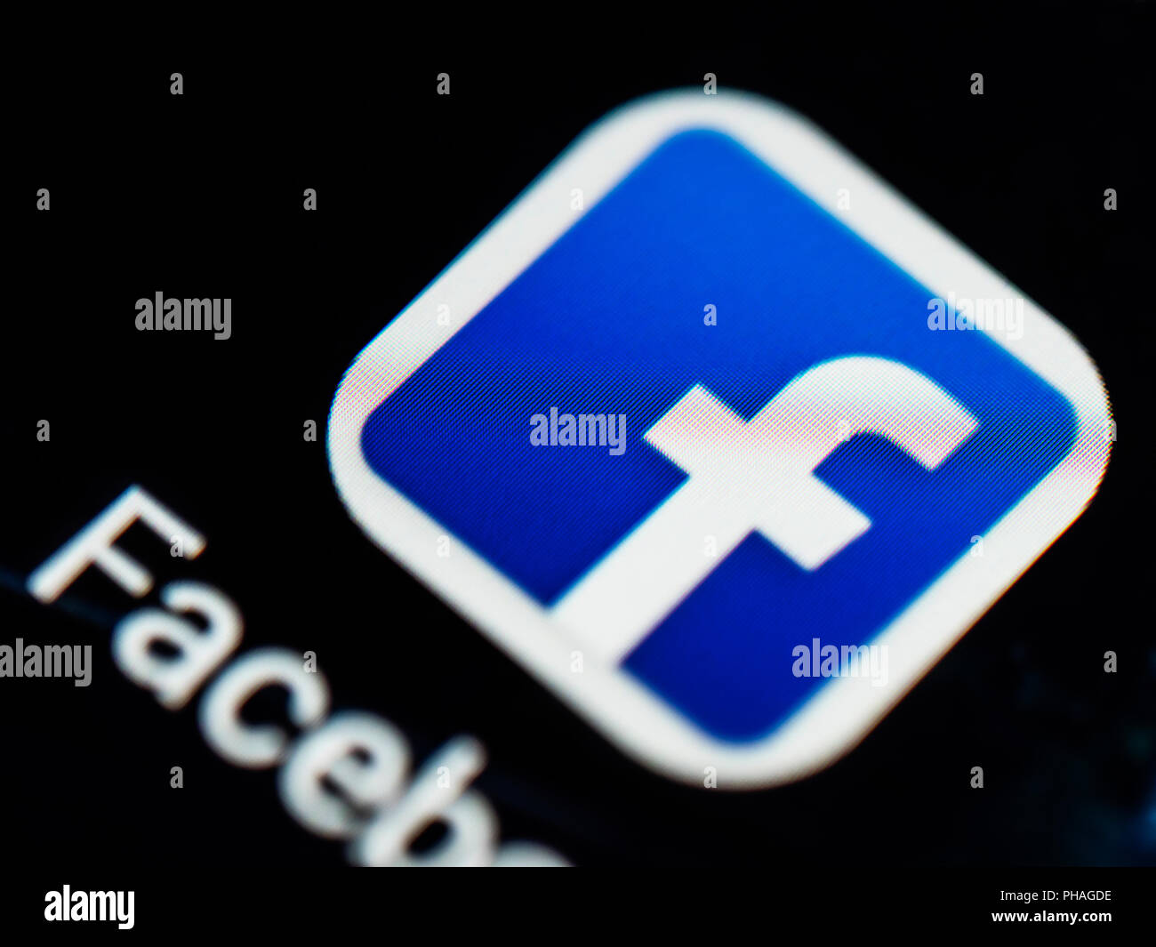 The Facebook logo seen displayed on a smart phone Stock Photo - Alamy