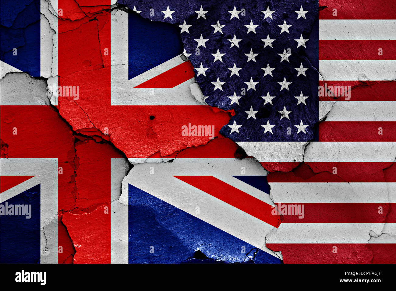 flags of UK and USA painted on cracked wall Stock Photo