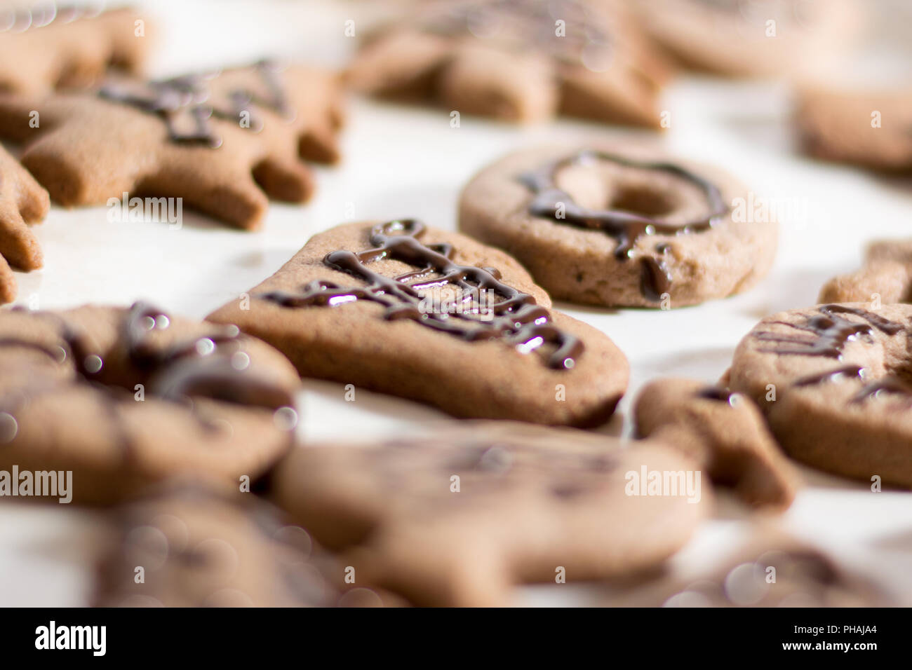 Decoration on gingerbread cookie close up. Stock Photo