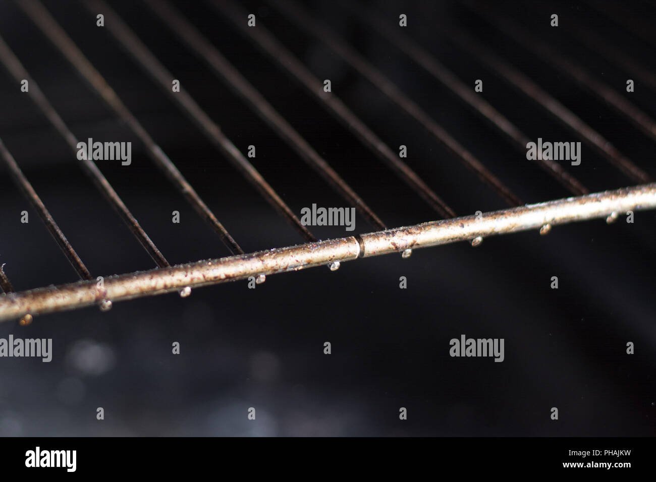 Photo of dirty greasy oven grates. Stock Photo