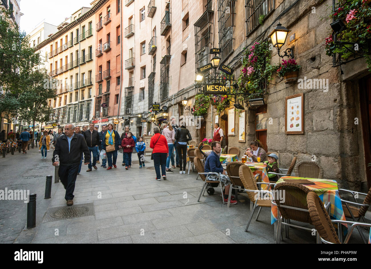 Calle Cava de San Miguel in the evening, where people can find plenty of restaurants. Madrid, Spain Stock Photo