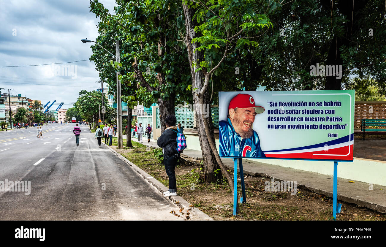 Street sign with inspirational quote from Fidel Castro about Cuba's sports program. Stock Photo