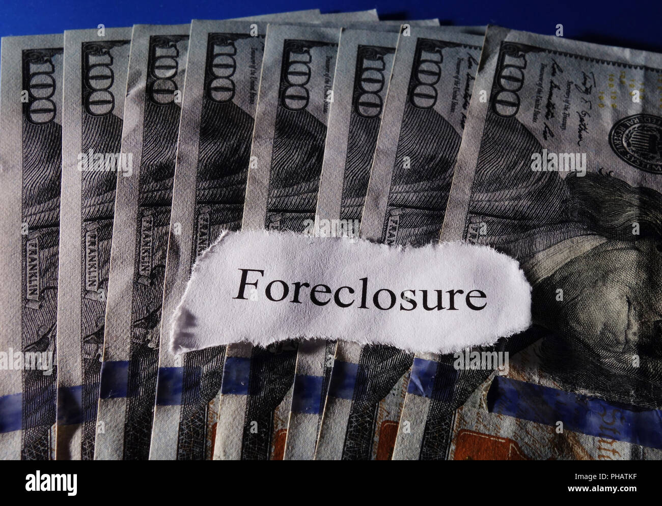 Forecloser headline on cash Stock Photo