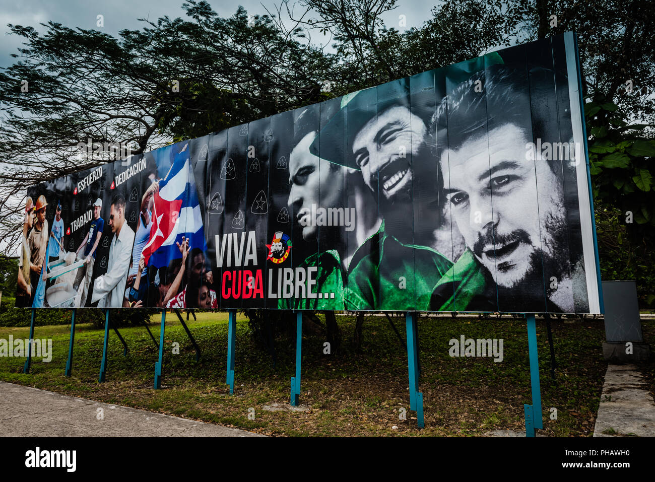 Propaganda billboard propaganda showing Cuban leaders; translation means Long Live Free Cuba. Stock Photo