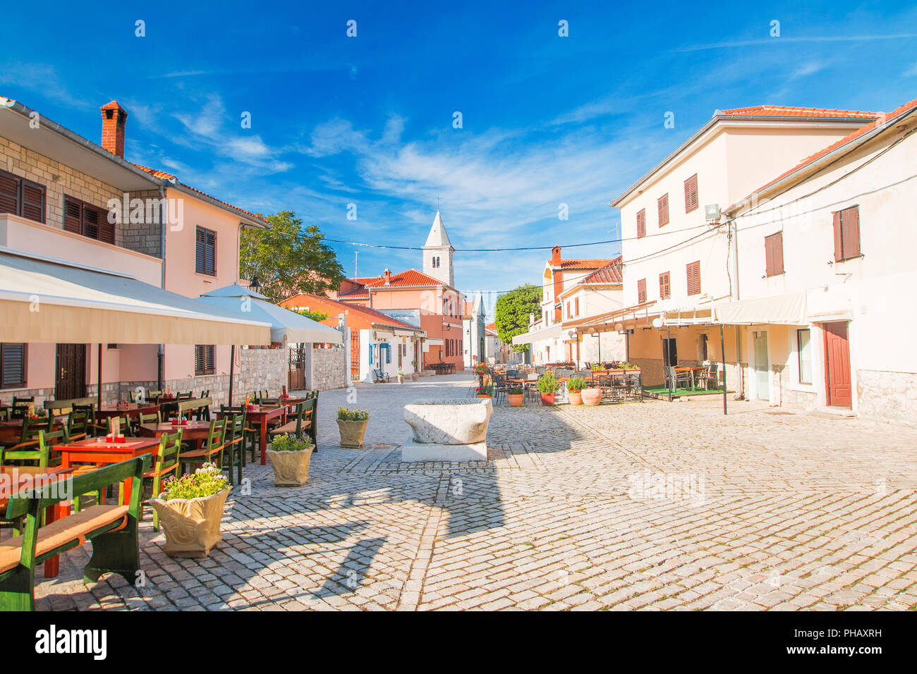 Street cafes in the old medieval historic town of Nin, Dalmatia ...