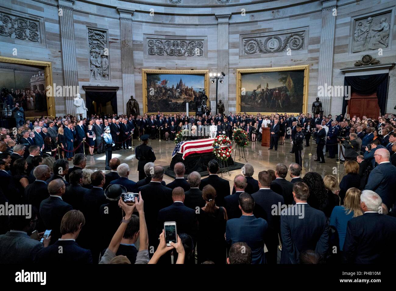 https://c8.alamy.com/comp/PHB10M/washington-31st-aug-2018-cindy-mccain-wife-of-sen-john-mccain-r-ariz-stands-over-her-husbands-casket-as-he-lies-in-state-in-the-rotunda-of-the-us-capitol-friday-aug-31-2018-in-washington-ap-photoandrew-harnik-pool-usage-worldwide-credit-dpaalamy-live-news-PHB10M.jpg