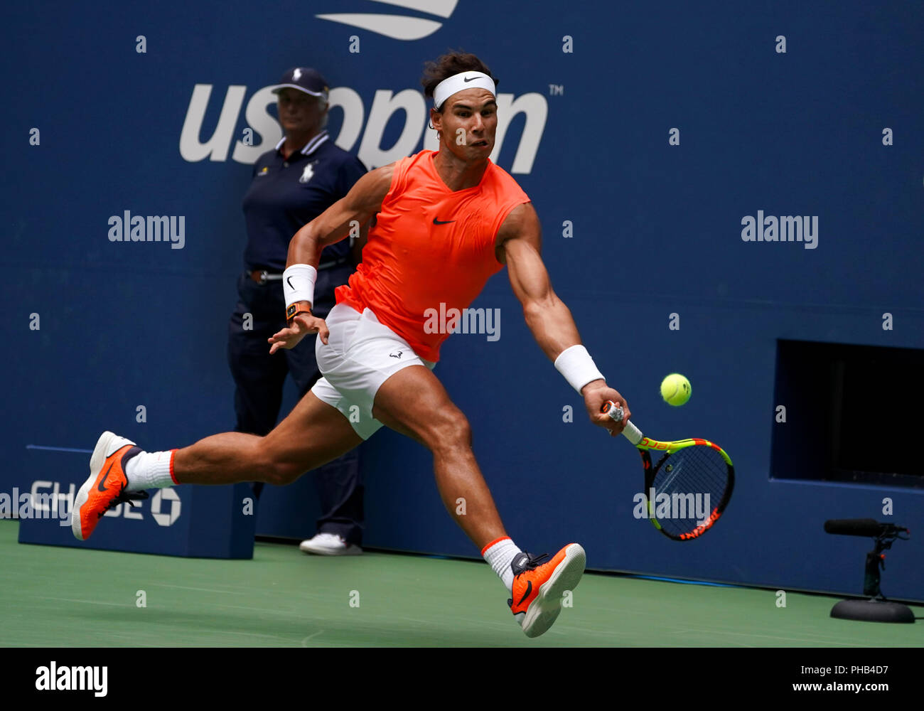 Flushing Meadows, New York - August 31, 2018: US Open Tennis: Number 1seed  Rafael Nadal serving to his opponent Karen Khachanov of Russia during their  third round match at the US Open